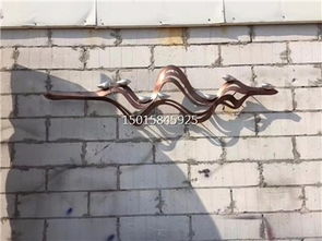 匠心雕琢 售樓部戶外不銹鋼藝術背景墻，激光圍邊與手工鍛造的藝術對話